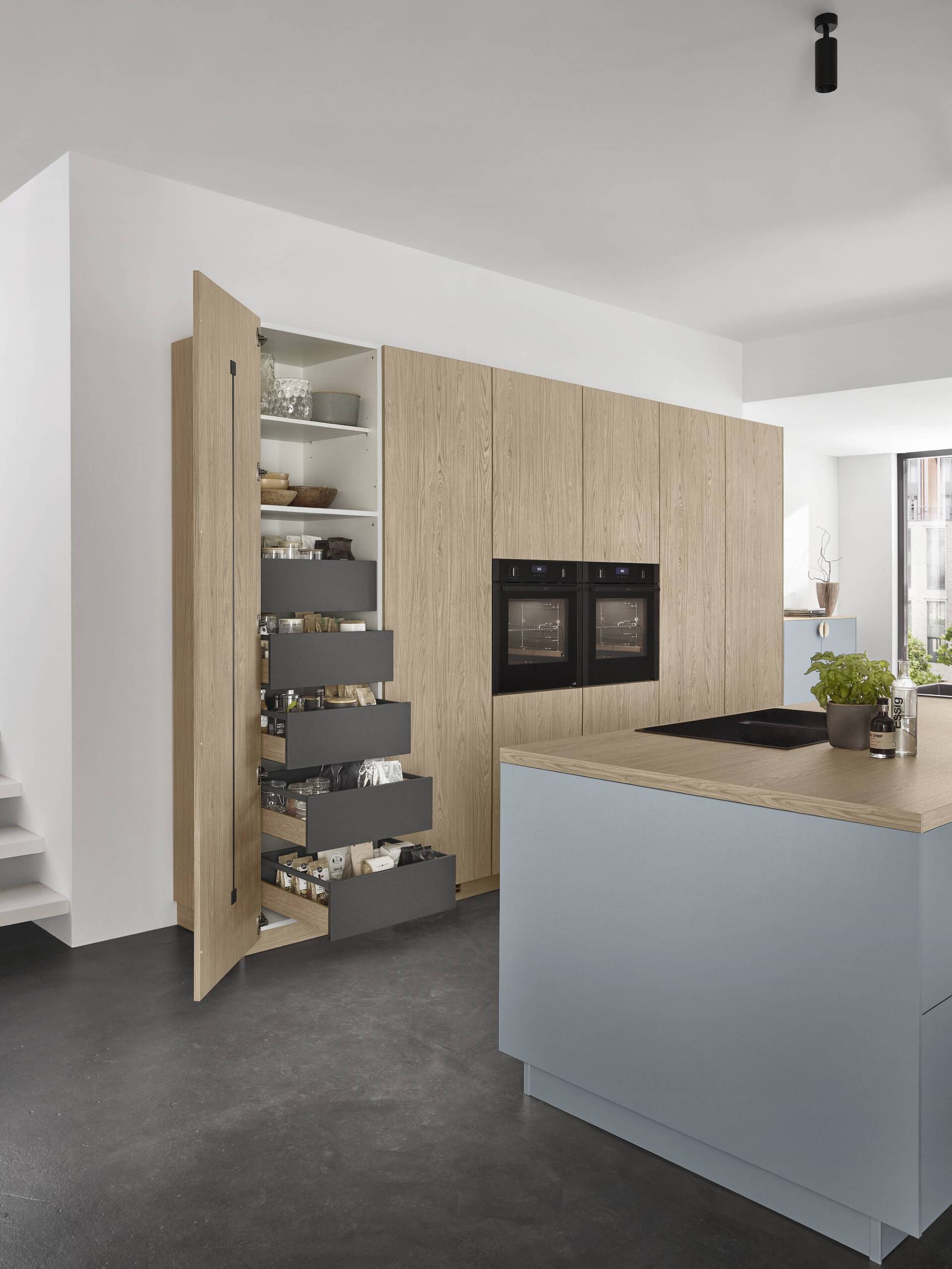 Cocina escamoteable con detalle de panel abierto